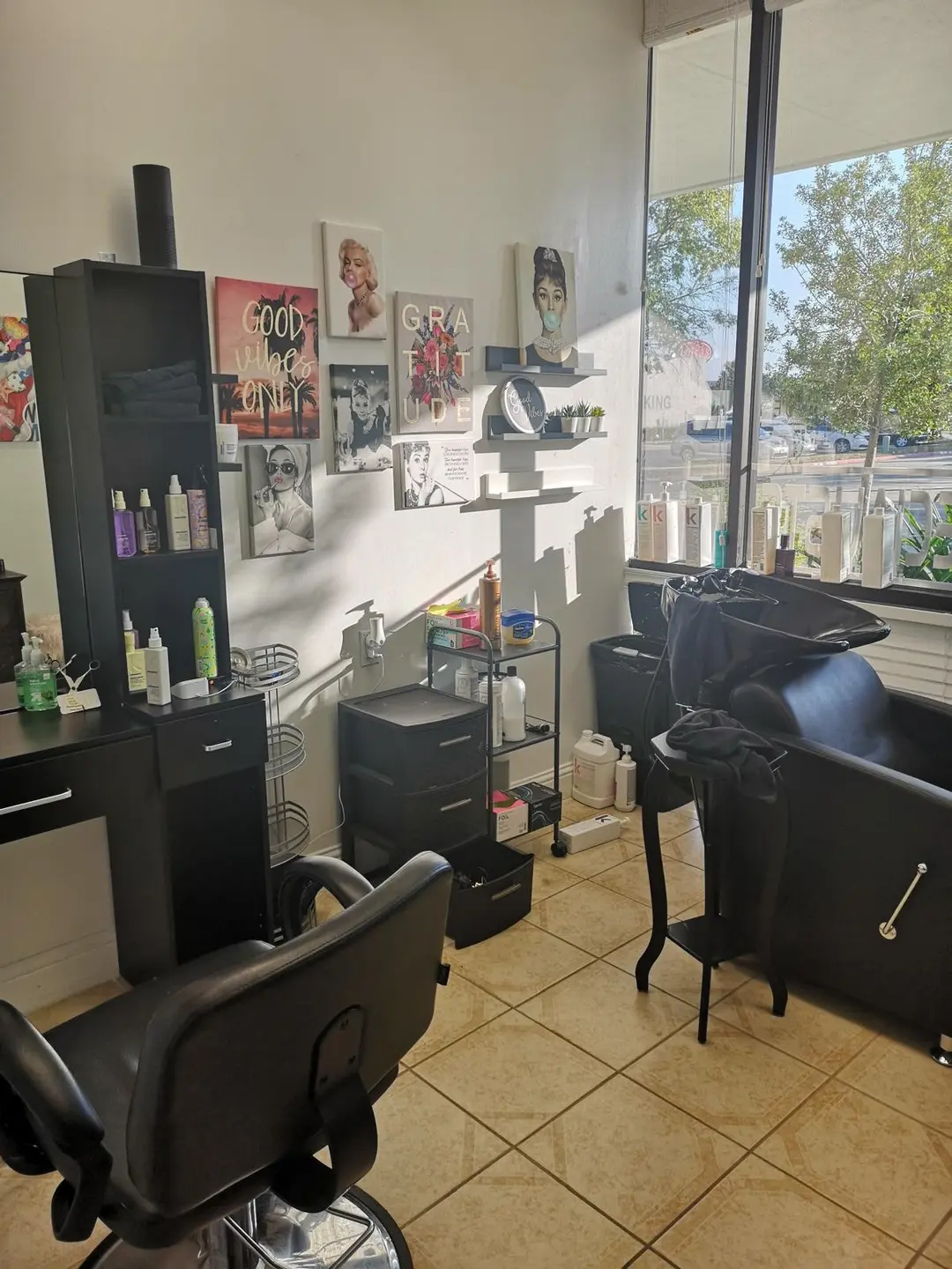 Private window salon suite interior with styling station and shampoo basin at Ava Salon Suites in Grapevine, Texas